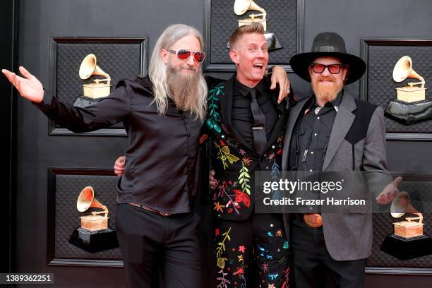 Troy Sanders, Brann Dailor, and Brent Hinds of Mastodon attend the 64th Annual GRAMMY Awards at MGM Grand Garden Arena on April 03, 2022 in Las...