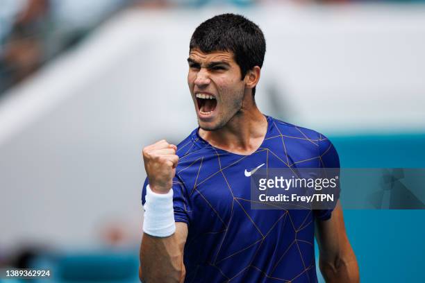Carlos Alcaraz of Spain celebrates during his match against Casper Ruud of Norway in the men's final of the Miami Open at the Hard Rock Stadium on...