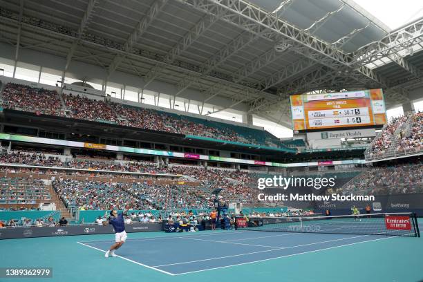 Carlos Alcaraz of Spain serves to Casper Ruud of Norway during the men's final of the Miami Open at Hard Rock Stadium on April 03, 2022 in Miami...