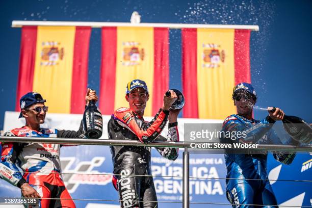 Top3 Riders celebrate on the podium during the MotoGP race of Argentina at the Autódromo Termas de Río Hondo on April 03, 2022 in Termas de Rio...