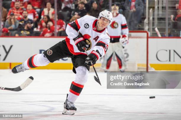 Nick Holden of the Ottawa Senators shoots the puck against the Detroit Red Wings during the second period of an NHL game at Little Caesars Arena on...