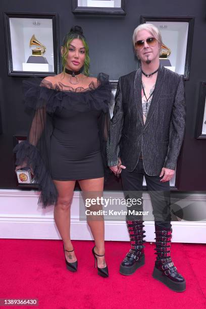 Rita Lowery and John 5 of Rob Zombie attend the 64th Annual GRAMMY Awards at MGM Grand Garden Arena on April 03, 2022 in Las Vegas, Nevada.