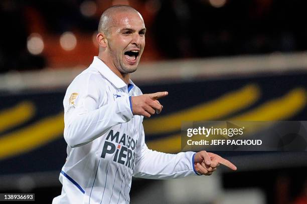 Auxerre's Israeli midfielder Ben Sahar celebrates after scoring a goal during the French League Cup football match Auxerre vs Caen, on October 26,...