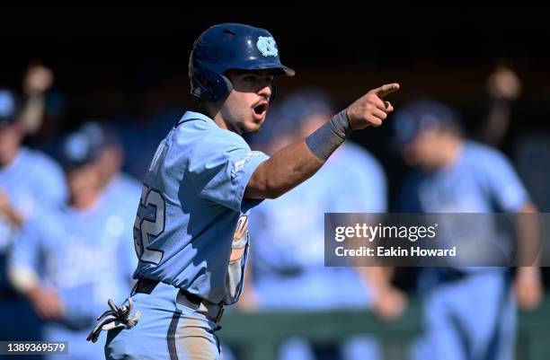 Tomas Frick of the North Carolina Tar Heels celebrates after crossing home plate against the Virginia Tech Hokies during the sixth inning at Boshamer...