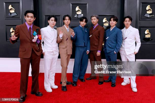 Suga, Jin, Jungkook, RM, Jimin and J-Hope of BTS attend the 64th Annual GRAMMY Awards at MGM Grand Garden Arena on April 03, 2022 in Las Vegas,...