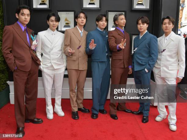 Suga, Jin, Jungkook, RM, Jimin and J-Hope of BTS attend the 64th Annual GRAMMY Awards at MGM Grand Garden Arena on April 03, 2022 in Las Vegas,...