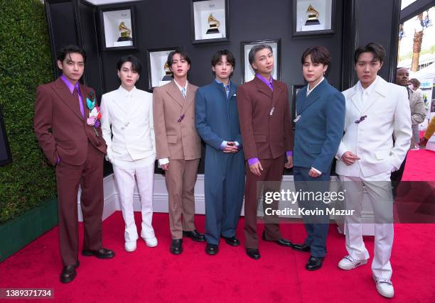 Suga, Jin, Jungkook, RM, Jimin and J-Hope of BTS attend the 64th Annual GRAMMY Awards at MGM Grand Garden Arena on April 03, 2022 in Las Vegas,...