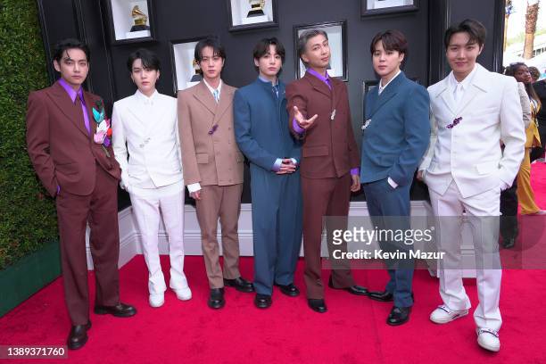 Suga, Jin, Jungkook, RM, Jimin and J-Hope of BTS attend the 64th Annual GRAMMY Awards at MGM Grand Garden Arena on April 03, 2022 in Las Vegas,...