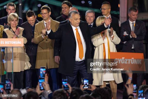 Hungarian Prime Minister Viktor Orbán acknowledges supporters after announcement of partial results in the parliamentary election on April 3, 2022 in...