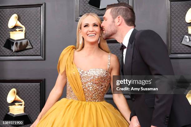 Carrie Underwood and Mike Fisher attend the 64th Annual GRAMMY Awards at MGM Grand Garden Arena on April 03, 2022 in Las Vegas, Nevada.