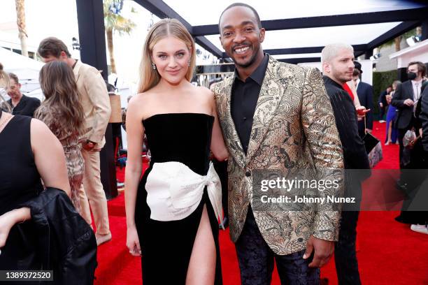 Kelsea Ballerini and Anthony Mackie attend the 64th Annual GRAMMY Awards at MGM Grand Garden Arena on April 03, 2022 in Las Vegas, Nevada.