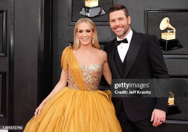 Carrie Underwood and Mike Fisher attend the 64th Annual GRAMMY Awards at MGM Grand Garden Arena on April 03, 2022 in Las Vegas, Nevada.