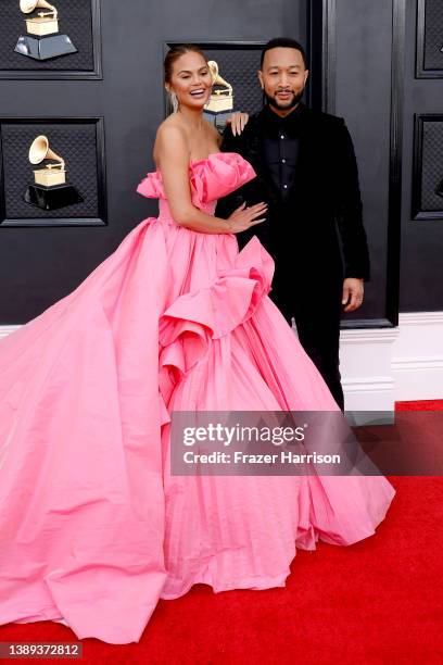 Chrissy Teigen and John Legend attend the 64th Annual GRAMMY Awards at MGM Grand Garden Arena on April 03, 2022 in Las Vegas, Nevada.