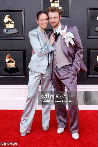 Claudia Sulewski and FINNEAS attend the 64th Annual GRAMMY Awards at MGM Grand Garden Arena on April 03, 2022 in Las Vegas, Nevada.