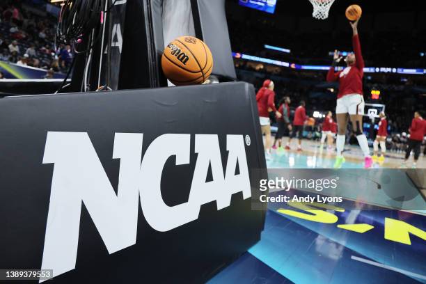 The NCAA logo and a game ball as the South Carolina Gamecocks warm-up before the game against the UConn Huskies during the 2022 NCAA Women's...