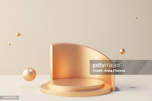 abstract futuristic golden podium with many decorative flying spheres. platform for beauty products presentation. three dimensional illustration - bola na cara imagens e fotografias de stock