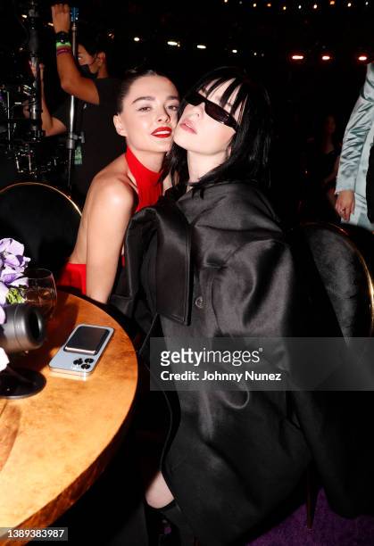 Charlotte Lawrence and Billie Eilish attend the 64th Annual GRAMMY Awards at MGM Grand Garden Arena on April 03, 2022 in Las Vegas, Nevada.