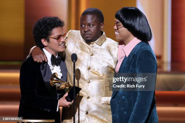 Bruno Mars, Dernst Emile II, and Anderson .Paak accept the Song Of The Year award for ‘Leave The Door Open’ onstage during the 64th Annual GRAMMY...