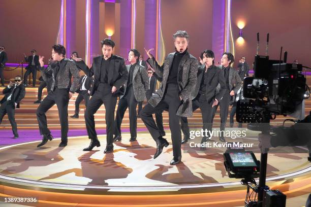 Jimin, J-Hope, Jin, RM, Suga, and V of BTS perform onstage during the 64th Annual GRAMMY Awards at MGM Grand Garden Arena on April 03, 2022 in Las...