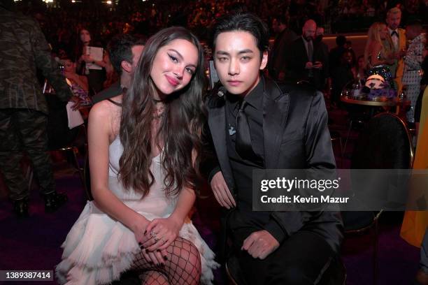 Olivia Rodrigo and V of BTS pose during the 64th Annual GRAMMY Awards at MGM Grand Garden Arena on April 03, 2022 in Las Vegas, Nevada.