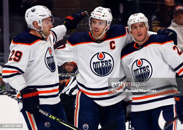 Leon Draisaitl, Connor McDavid and Tyson Barrie of the Edmonton Oilers celebrate a goal against the Anaheim Ducks in the first period at Honda Center...