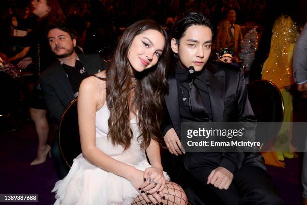 Olivia Rodrigo and V of BTS attend the 64th Annual GRAMMY Awards at MGM Grand Garden Arena on April 03, 2022 in Las Vegas, Nevada.