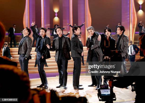 Jimin, J-Hope, Jin, Jungkook, RM, Suga, and V of BTS perform onstage during the 64th Annual GRAMMY Awards at MGM Grand Garden Arena on April 03, 2022...