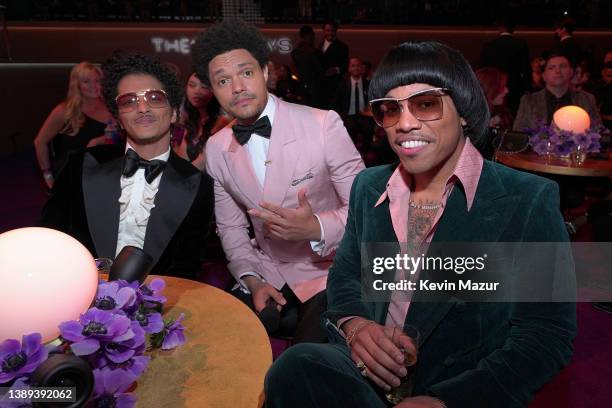 Bruno Mars, Trevor Noah, and Anderson .Paak attend the 64th Annual GRAMMY Awards at MGM Grand Garden Arena on April 03, 2022 in Las Vegas, Nevada.