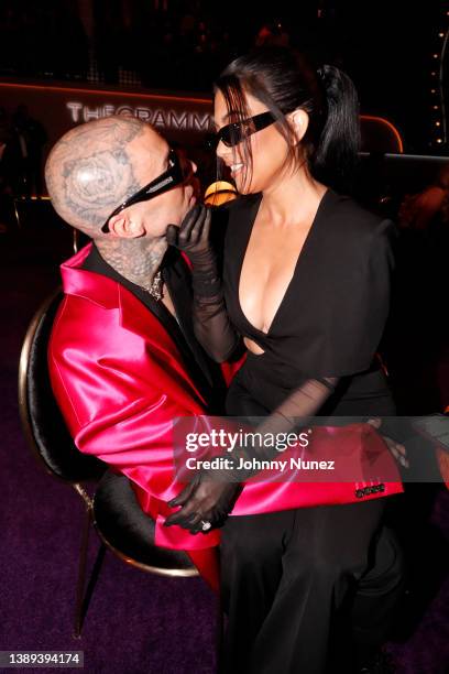 Travis Barker and Kourtney Kardashian attend the 64th Annual GRAMMY Awards at MGM Grand Garden Arena on April 03, 2022 in Las Vegas, Nevada.
