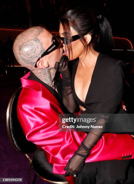 Travis Barker and Kourtney Kardashian attend the 64th Annual GRAMMY Awards at MGM Grand Garden Arena on April 03, 2022 in Las Vegas, Nevada.