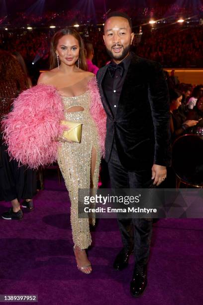 Chrissy Teigen and John Legend attend the 64th Annual GRAMMY Awards at MGM Grand Garden Arena on April 03, 2022 in Las Vegas, Nevada.