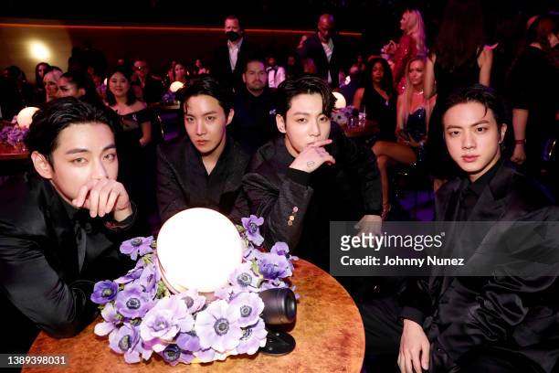 Hope, Jungkook, and Jin of BTS attend the 64th Annual GRAMMY Awards at MGM Grand Garden Arena on April 03, 2022 in Las Vegas, Nevada.