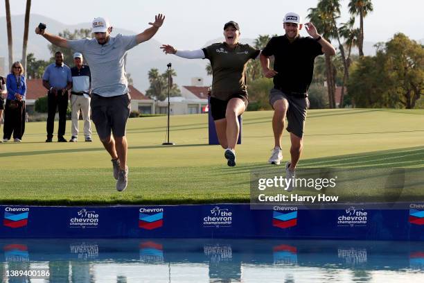Jennifer Kupcho of the United States jumps into Poppie's Pond after winning The Chevron Championship at The Westin Mission Hills Golf Resort & Spa on...