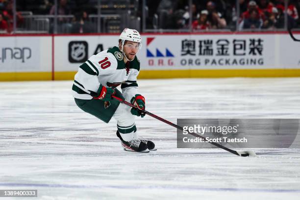 Tyson Jost of the Minnesota Wild skates with the puck against the Washington Capitals during the third period of the game at Capital One Arena on...
