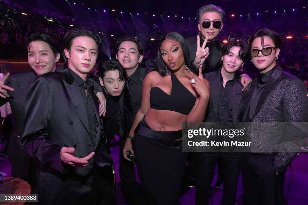 Hope, Jin, Jungkook, V, Megan Thee Stallion, RM, Suga, and Jimin pose during the 64th Annual GRAMMY Awards at MGM Grand Garden Arena on April 03,...