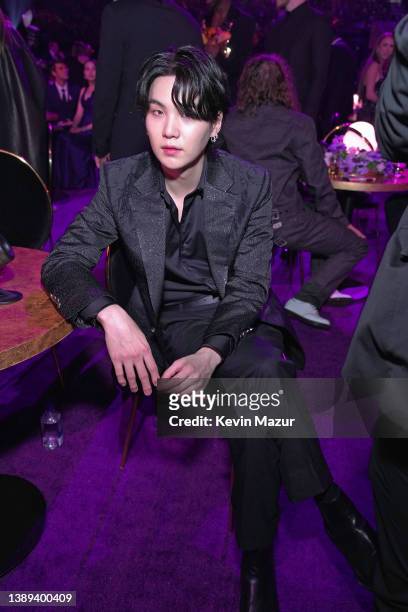 Suga of BTS poses during the 64th Annual GRAMMY Awards at MGM Grand Garden Arena on April 03, 2022 in Las Vegas, Nevada.
