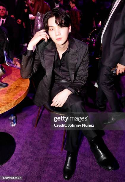 Suga of BTS during the 64th Annual GRAMMY Awards at MGM Grand Garden Arena on April 03, 2022 in Las Vegas, Nevada.