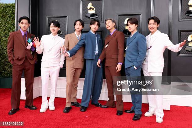 Suga, Jin, Jungkook, RM, Jimin and J-Hope of BTS attends the 64th Annual GRAMMY Awards at MGM Grand Garden Arena on April 03, 2022 in Las Vegas,...