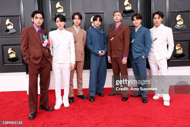 Suga, Jin, Jungkook, RM, Jimin and J-Hope of BTS attends the 64th Annual GRAMMY Awards at MGM Grand Garden Arena on April 03, 2022 in Las Vegas,...