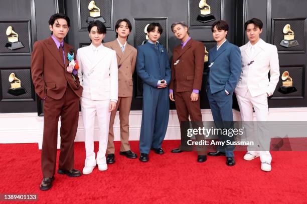 Suga, Jin, Jungkook, RM, Jimin and J-Hope of BTS attends the 64th Annual GRAMMY Awards at MGM Grand Garden Arena on April 03, 2022 in Las Vegas,...