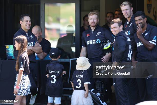 The New Zealand team prepare to take the field with Ross Taylor of New Zealand and his children Adelaide, Jonty and Mackenzie during the national...