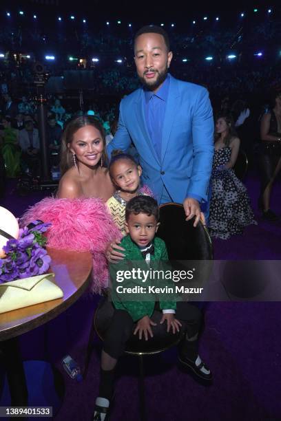 Chrissy Teigen, Luna Stephens, Miles Stephens, and John Legend attend the 64th Annual GRAMMY Awards at MGM Grand Garden Arena on April 03, 2022 in...