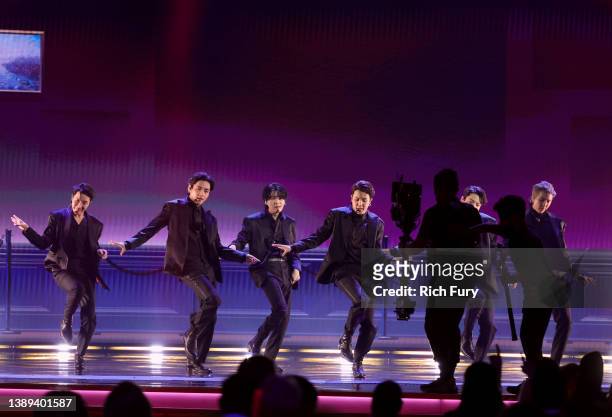 Hope, V, Suga, Jimin, Jungkook and RM of BTS perform onstage during the 64th Annual GRAMMY Awards at MGM Grand Garden Arena on April 03, 2022 in Las...