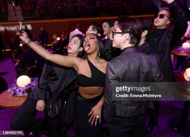 Megan Thee Stallion and BTS attend the 64th Annual GRAMMY Awards at MGM Grand Garden Arena on April 03, 2022 in Las Vegas, Nevada.