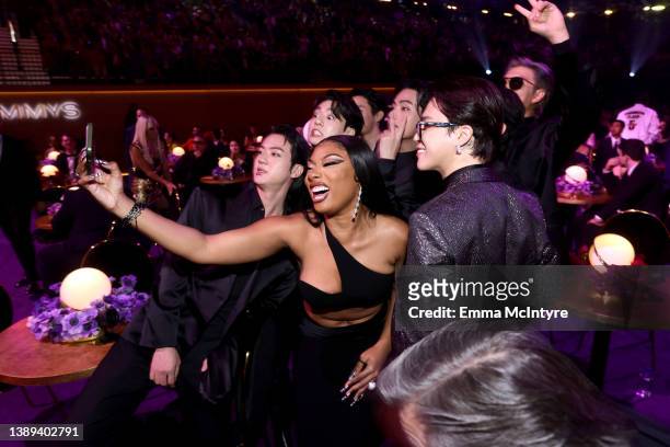 Megan Thee Stallion and BTS attend the 64th Annual GRAMMY Awards at MGM Grand Garden Arena on April 03, 2022 in Las Vegas, Nevada.
