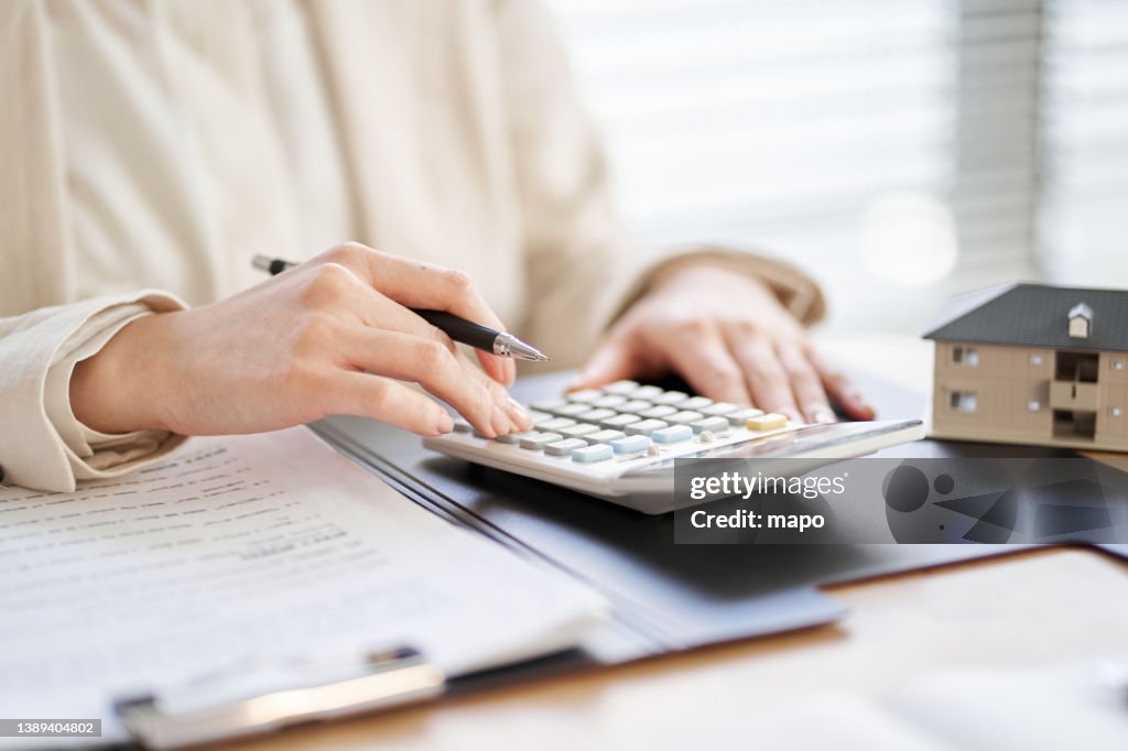 Asian women taking real estate quotes