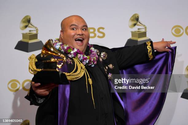 Kalani Pe'a winner for the Best Regional Roots Music Album Award for 'Kau Ka Pe'a' poses in the winners photo room during the 64th Annual GRAMMY...