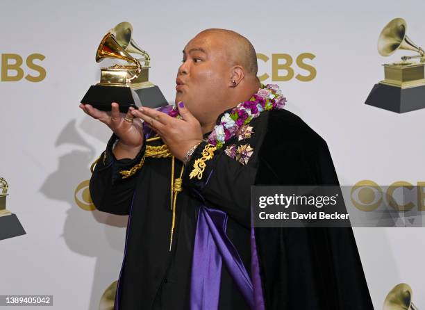 Kalani Pe'a winner for the Best Regional Roots Music Album Award for 'Kau Ka Pe'a' poses in the winners photo room during the 64th Annual GRAMMY...