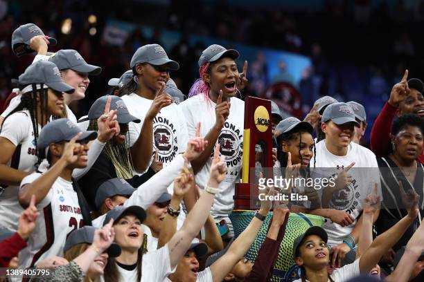 Aliyah Boston and the South Carolina Gamecocks pose with the national championship trophy after defeating the UConn Huskies 64-49 during the 2022...
