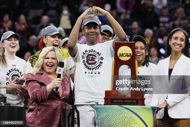 Aliyah Boston of the South Carolina Gamecocks reacts during the national championship trophy presentation after defeating the UConn Huskies 64-49...